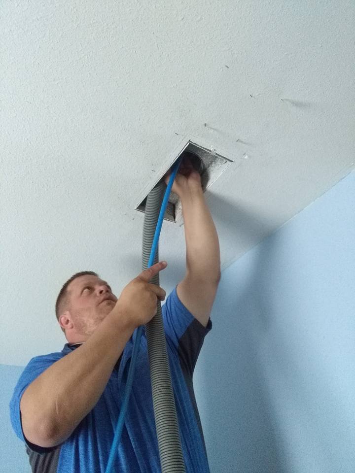 air vent cleaning in progress